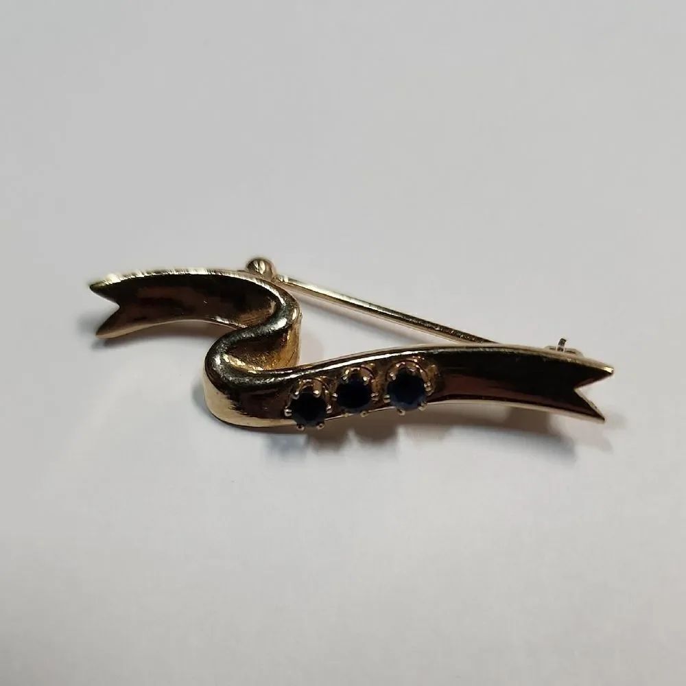Avon Gold Tone Blue Sapphire Ribbon Pin, Signed